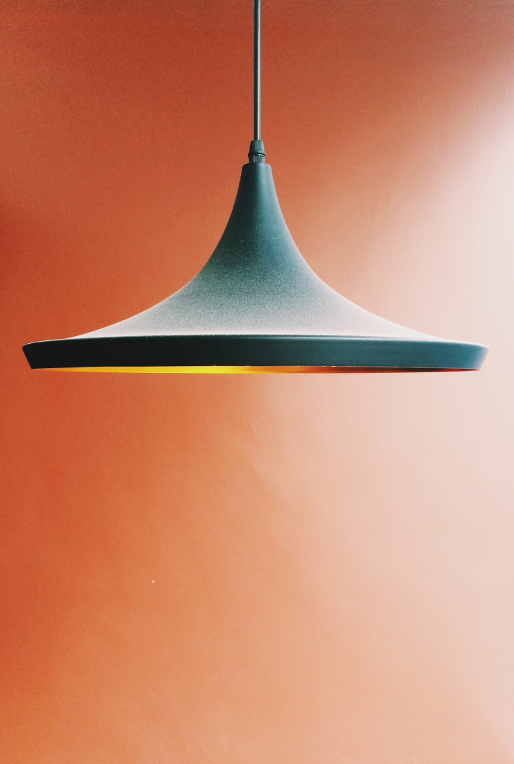 this is a blue lamp with an orange background